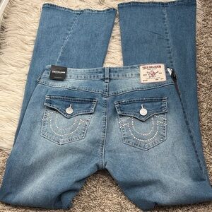 NWT True Religion Light Blue Denim with Embellished Pockets. Crystals on pockets